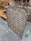 A VINTAGE WROUGHT IRON FIRE SCREEN