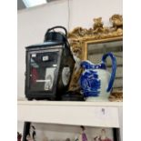 A LARGE CARRIAGE LANTERN AND AN IRONSTONE TYPE BLUE AND WHITE JUG.