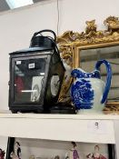 A LARGE CARRIAGE LANTERN AND AN IRONSTONE TYPE BLUE AND WHITE JUG.