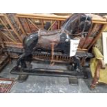 A ANTIQUE PAINTED WOOD ROCKING HORSE