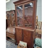 A 19th C. MAHOGANY BOOKCASE ON CABINET H 239 X 112 X 39 CM