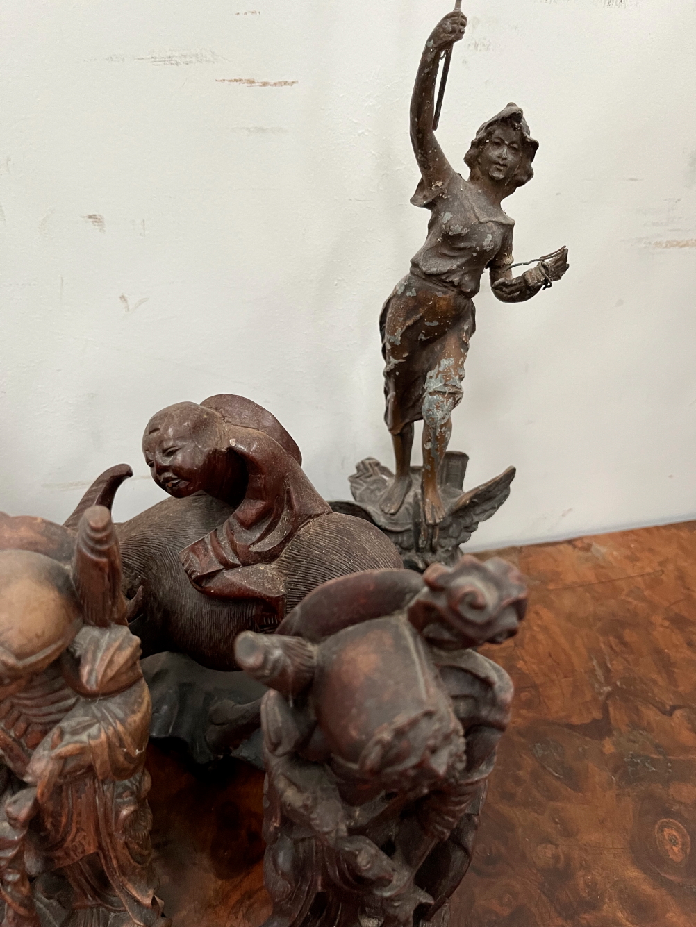 FOUR CHINESE CARVED WOOD FIGURES, ANOTHER IN SOAPSTONE, A PAIR OF SPELTER FIGURES AND AN IRON BEAR. - Image 4 of 4