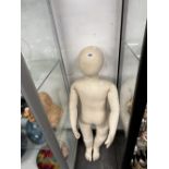 A CHILD MANNEQUIN.