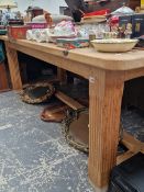 A LARGE PINE REFECTORY TYPE TABLE ON SUBSTANTIAL SQUARE LEGS
