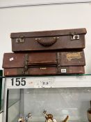 TWO VINTAGE LEATHER SUITCASES.