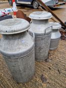 THREE ALLOY MILK CHURNS, A SHEPHERDS CROOK AND PITCH FORK AND A SEED DISTRIBUTOR