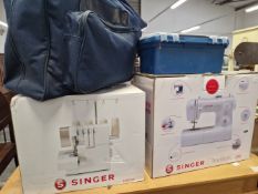 A MODERN SINGER SEWING MACHINE AND ACCESSORIES