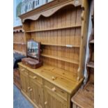 A MODERN PINE KITCHEN DRESSER H 200 X 158 X 48 CM