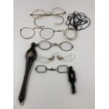 AN ASSORTMENT OF VINTAGE SPECTACLES, TWO PAIRS OF FOLDING OPERA GLASSES, AND AN MONOCLE.
