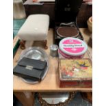 AN HMV WIND UP GRAMOPHONE, A FOOTSTOOL, TWO CAKE TINS, A LEATHER CASED VANITY SET AND PEWTER