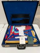 A SUITCASE OF MASONIC REGALIA AND BOOKLETS