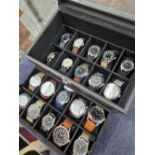 A COLLECTION OF TWENTY AS NEW WATCHES CONTAINED IN A TWO TIER WATCH BOX.