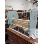 A VINTAGE DOLLS COT.