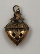 AN ANTIQUE HALLMARKED 9ct GOLD HEART PENDANT. WEIGHT 2.5grms.