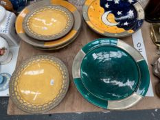 SEVEN METAL MOUNTED SAFI POTTERY DISHES