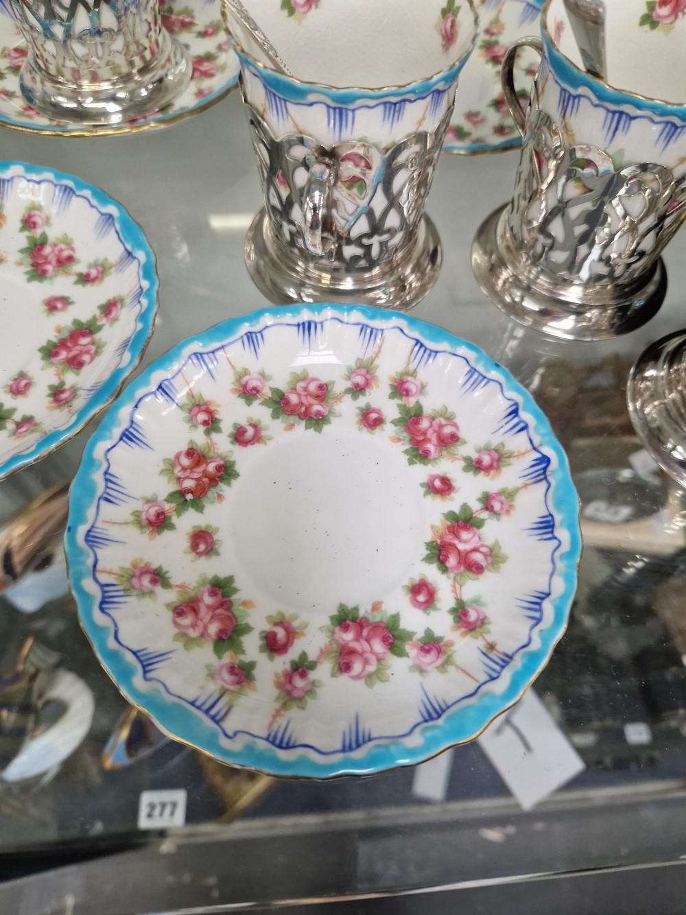 A ROYAL DOULTON COFFEE CAN AND SAUCER SET WITH HALLMARKED SILVER CARRIERS AND FIVER SILVER - Image 4 of 13