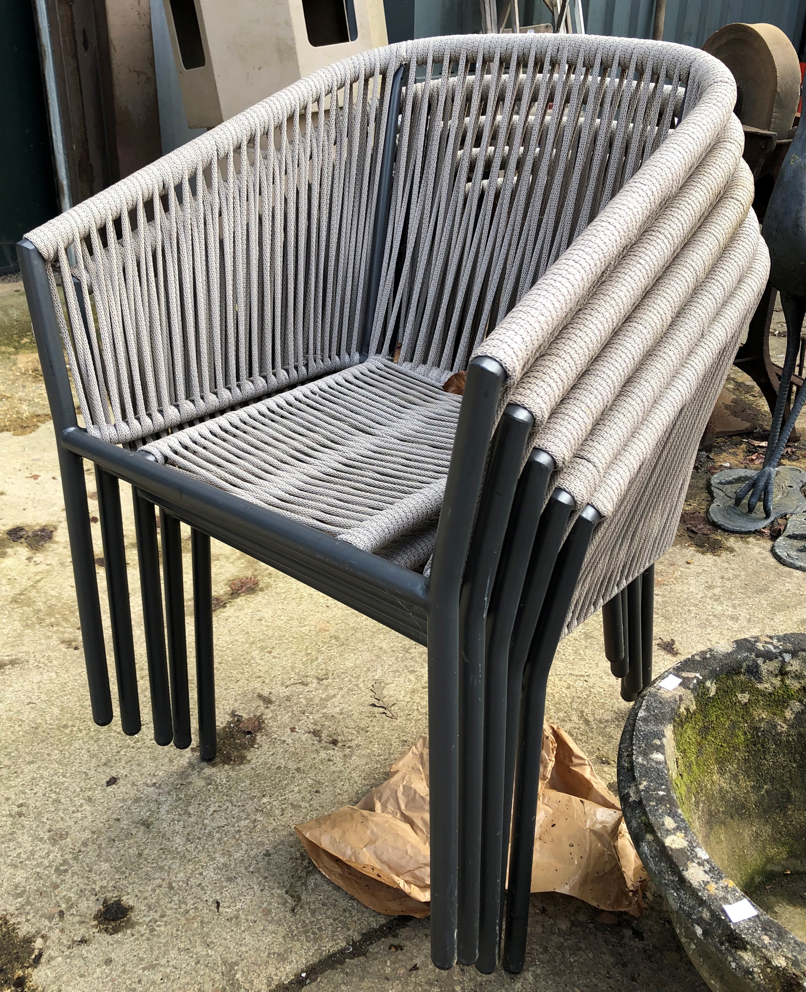 A GLASS TOP PATIO TABLE WITH A SET OF FIVE STACKING ROPE SEAT CHAIRS - Image 3 of 3