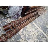 A PAIR OF CARVED MAHOGANY BED POSTS