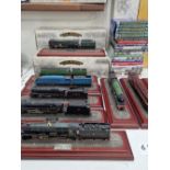 A HORNBY STEAM MEMORIES NINE TRAIN AND A COLLECTION OF DVD'S