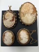 FOUR MODERN 9ct HALLMARKED GOLD CAMEO BROOCHES. LARGEST 4.3cms. GROSS WEIGHT 22.9grms.