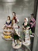 A LARGE PORCELAIN FIGURE GROUP, A PAIR OF GERMAN FIGURINES, AND A MODERN FIGURINE IN ART DECO DRESS.