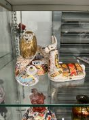 A ROYAL CROWN DERBY LLAMA PAPERWEIGHT, A LARGE SEATED LION AND A SMALL BIRD.
