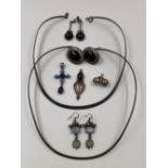 A COLLECTION OF SILVER JEWELLERY TO INCLUDE TWO TORQUE COLLARS, FOUR PAIRS OF VARIOUS EARRINGS,