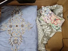 AN EMBROIDERED CUSHION TOGETHER WITH OTHER TEXTILES