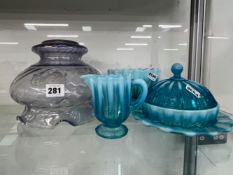 A VINTAGE OPAQUE BLUE GLASS BUTTER DISH, TOGETHER WITH JUG AND BOWL AND A GLASS LIGHT SHADE.