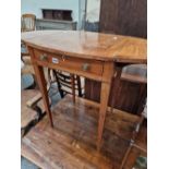 A SMALL REGENCY MAHOGANY DROP LEAF OCCASIONAL TABLE