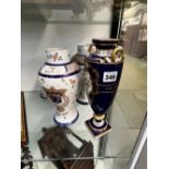 A PAIR OF FRENCH ARMORIAL LIDDED VASES AND A MINTONS TALL VASE.