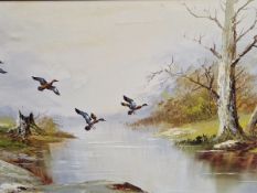 A DECORATIVE PAINTING OF DUCKS IN FLIGHT, SIGNED INDISTINCTLY, OIL ON CANVAS. 61 x 123cms