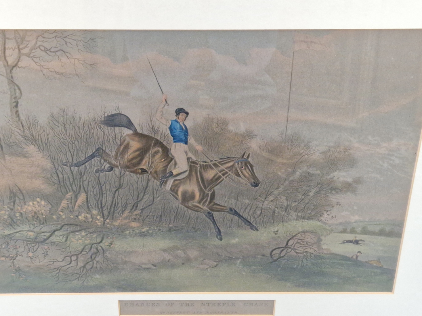 THREE ANTIQUE HAND COLOURED SPORTING PRINTS OF STEEPLE CHASE SCENES. 34 x 48cms, TOGETHER WITH A