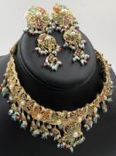 A TRADITIONAL INDIAN MARRIAGE SUITE COMPRISING OF AN ARTICULATED COLLAR NECK COLLAR WITH WOVEN METAL
