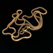 A BOX CHAIN NECKLACE WITH AN S SHAPE CLASP. LENGTH 42cms. UNHALLMARKED, ASSESSED AS 18ct GOLD.