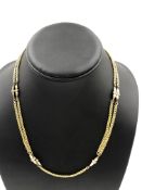 A DIAMOND SET NECK CHAIN. THE FANCY LINK WOVEN CHAIN INTERSPERSED WITH TWO FLAT TEARDROP SHAPE LINKS