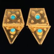 A PAIR OF GEOMETRIC ARTICULATED DROP EARRINGS. EACH PANEL SET WITH A CABOCHON TURQUOISE, WITH A