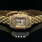 A LADIES 18ct GOLD CARTIER PANTHERE 128 2 WATCH WITH DOUBLE DIAMOND BEZEL ON FOLDING BRACELET