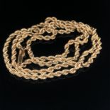 A SOLID GOLD ROPE CHAIN, WITH HOOK AND EYE CLASP STAMPED 22k,ASSESSED AS 22ct GOLD. LENGTH 52cms.