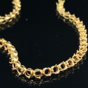 A TENNIS BRACELET SETTING WITHOUT STONES. LENGTH 18.5cms. UNMARKED, ASSESSED AS 18ct GOLD. WEIGHT