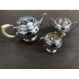 A VINTAGE FINNIGANS HALLMARKED SILVER THREE PIECE TEA SET. WEIGHT