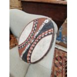 A MAASAI PAINTED LEATHER SHIELD