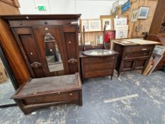 A MID 20th C. OAK BEDROOM SUITE OF A DRESSING CHEST, WASHSTAND AND WARDROBE WITH AN OVAL MIRRORED