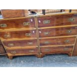 A PAIR OF VINTAGE CAMPAIGN STYLE YEW WOOD FOUR DRAWER SMALL CHESTS.