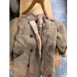 A FUR LINED THREE QUARTER LENGTH SHEEPSKIN JACKET