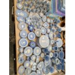 A COLLECTION OF WEDGWOOD BLUE JASPER WARES, TO INCLUDE BELLS AND A MINIATURE TEA SET