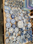 A COLLECTION OF WEDGWOOD BLUE JASPER WARES, TO INCLUDE BELLS AND A MINIATURE TEA SET