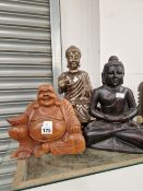 TWO FIGURES OF THE BUDDHA TOGETHER WITH A WOODEN FIGURE OF BUDAI LAUGHING