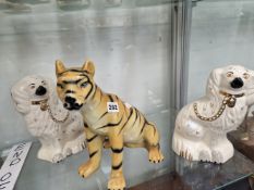A BONDIA POTTERY SEATED TIGER TOGETHER WITH A PAIR OF STAFFORDSHIRE SPANIELS
