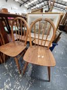 A SET OF FOUR HOOP BACKED KITCHEN CHAIRS